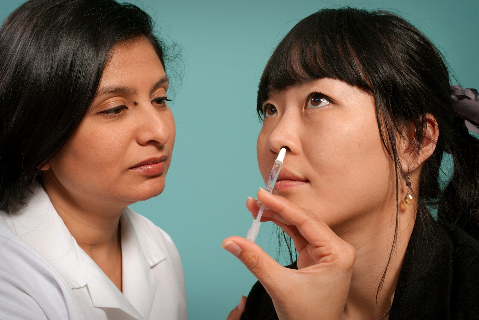 Consultation session between a patient and an acupuncture specialist discussing personalized care