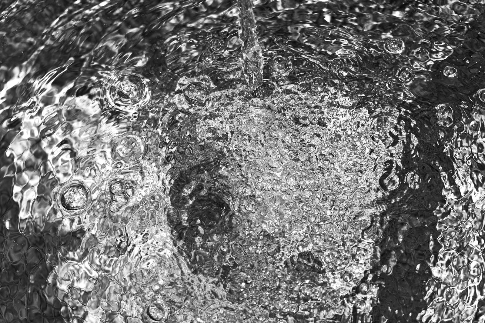 Close-up image of an acupuncturist placing fine needles on a patient